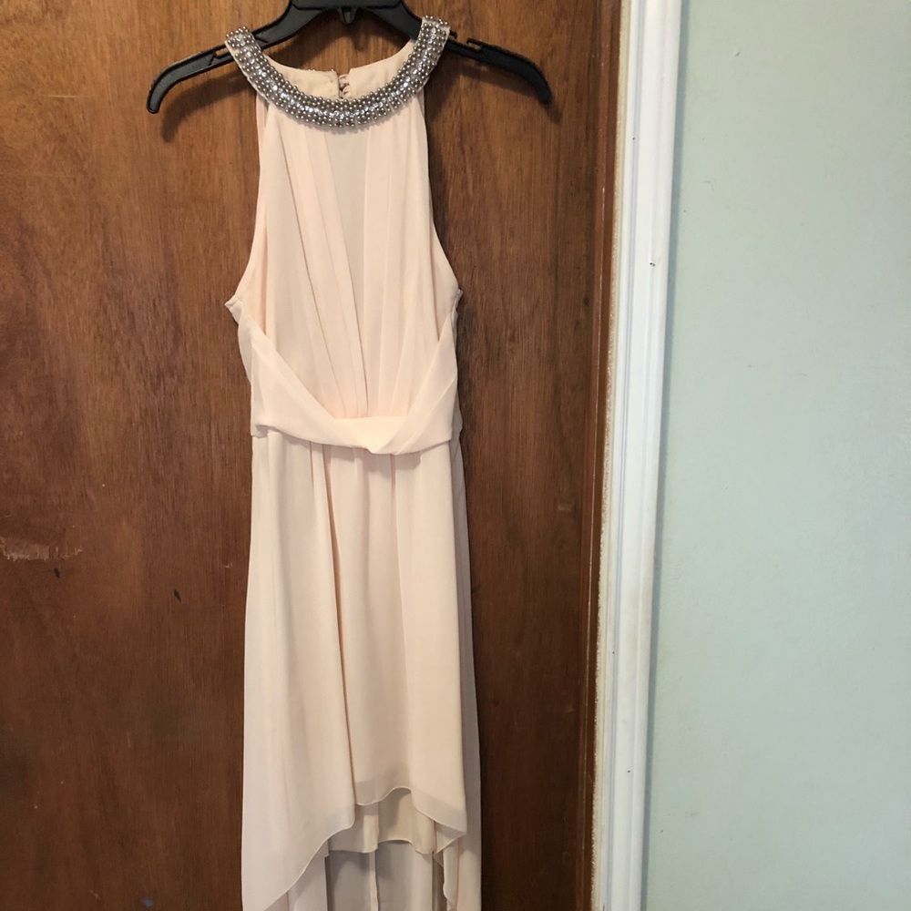 Creme dress with studs at the neck from Dillard’s